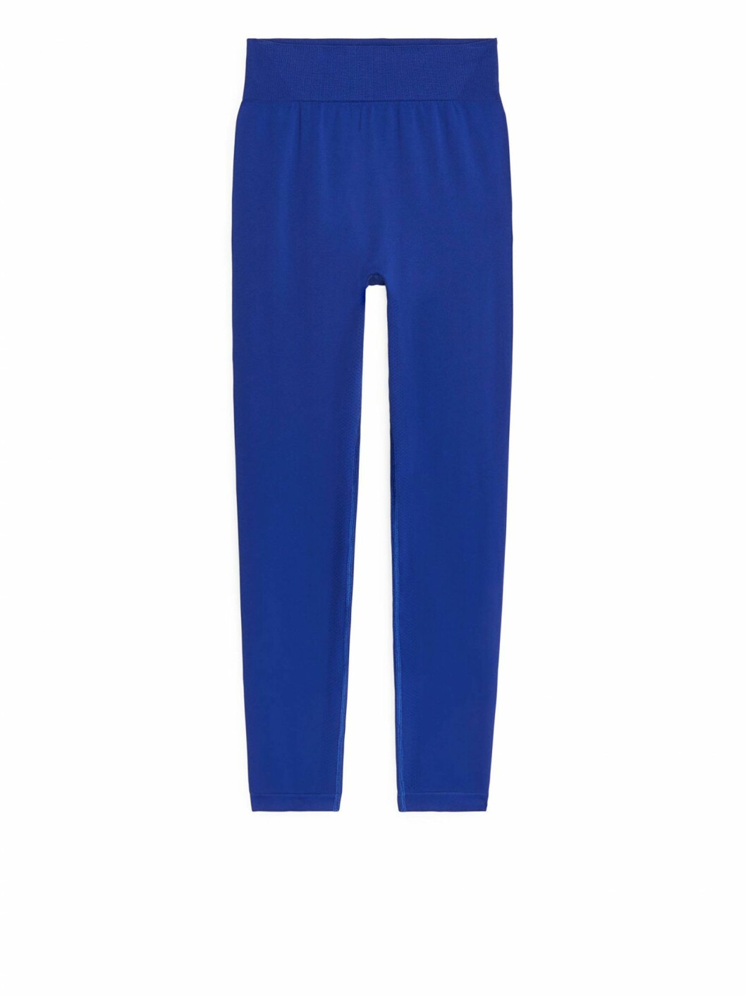 Matchande tights i kornblå nyans från Arket.