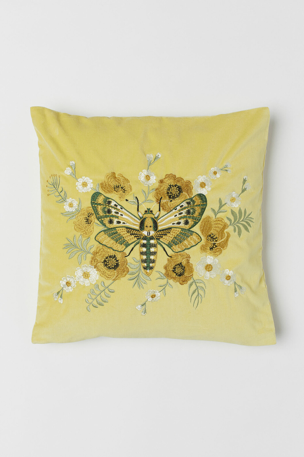 Gul kudde med fjäril från H&M home