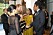 En bild på prins Harry som skakar hand med Jay-z. Med på bild är också hertiginnan Meghan Markle och Beyoncé.