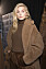 Elsa Hosk nel backstage con una giacca da orsacchiotto.