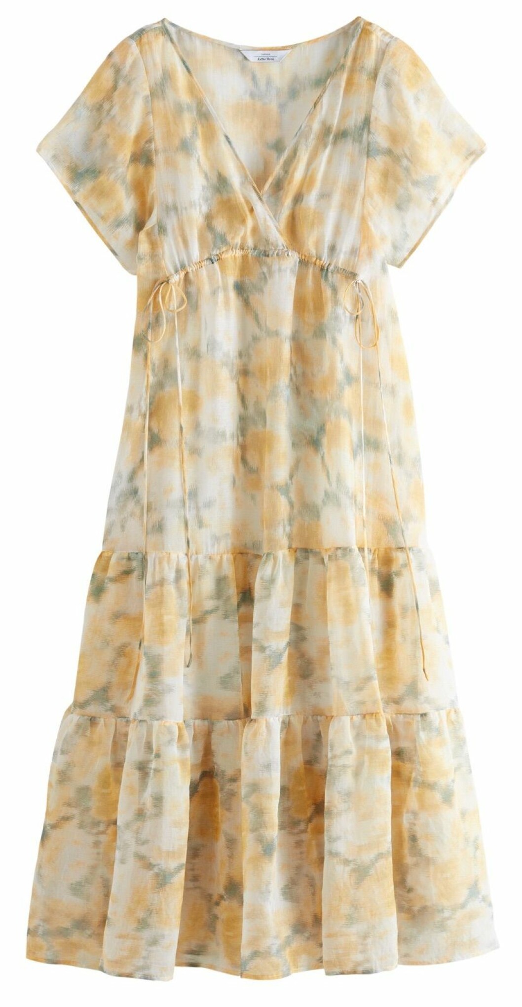 Gul och blommig klänning från & Other stories capsule collection.