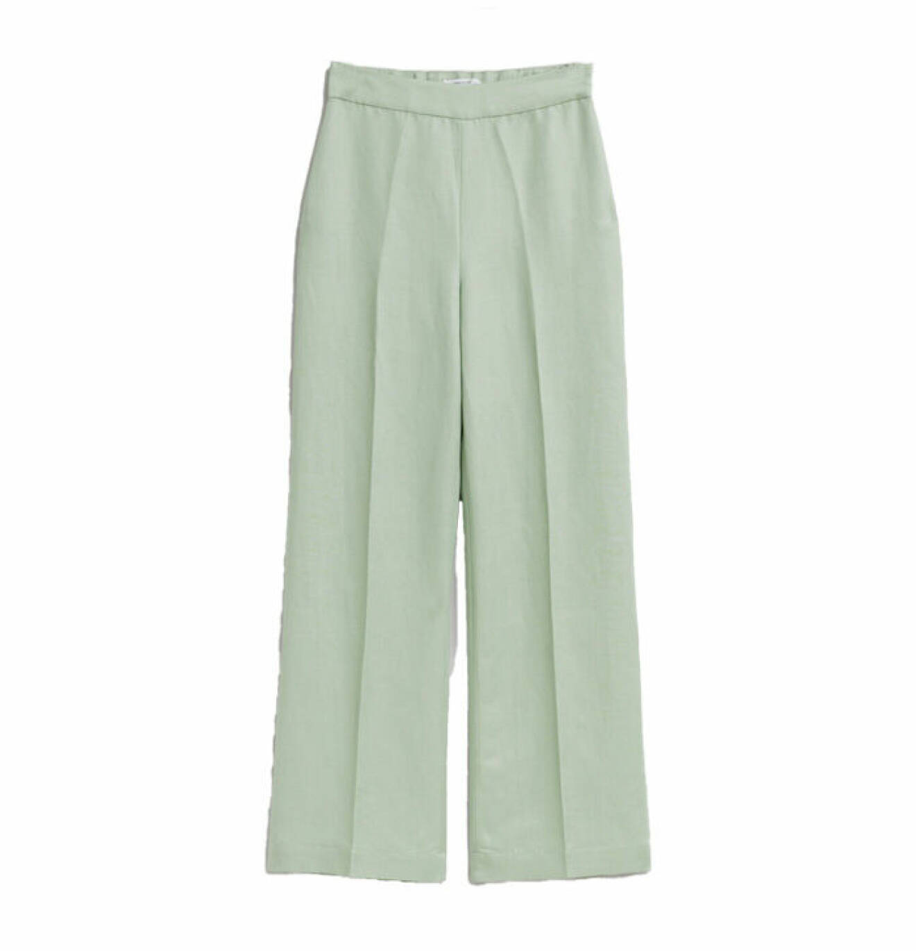 pastellgröna byxor gjorda i linne med veck på framsidan och vida ben från &amp; Other Stories