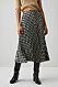 Plisserad kjol med rutmönster från Arket. 