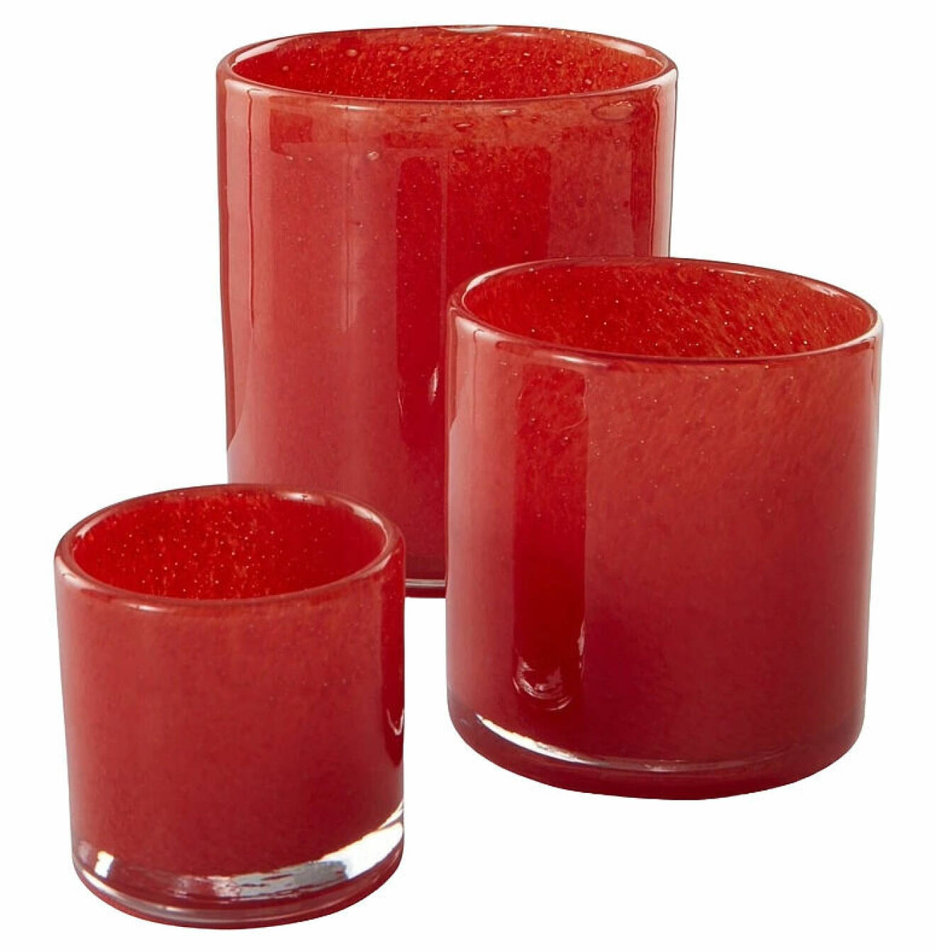 röd ljushållare i glas