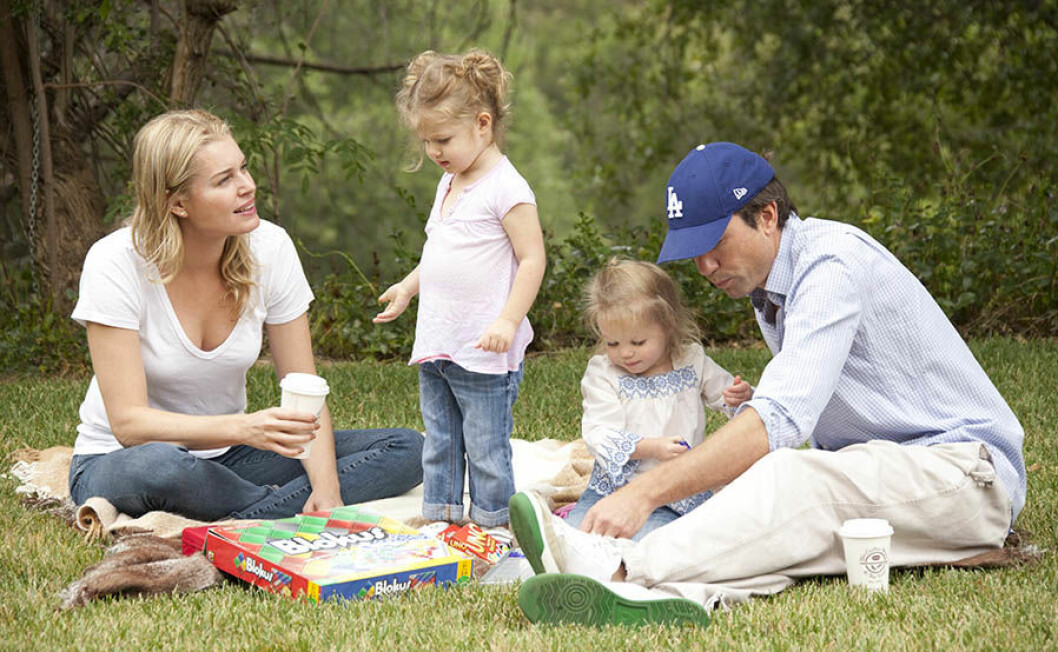 Hollywood husband and wife duo Rebecca Romijn and Jerry O'Connell spent the day in the park with their twins Charlie and Dolly. The family laughed as mom and dad played a game of UNO while keeping an eye on their energetic twins. Pictured: Rebecca Romijn, Jerry O'Connell, Charlie O'Connell and Dolly O'Connell Ref: SPL307811 150811 Picture by: Splash News Splash News and Pictures Los Angeles:310-821-2666 New York:212-619-2666 London:870-934-2666 photodesk@splashnews.com 