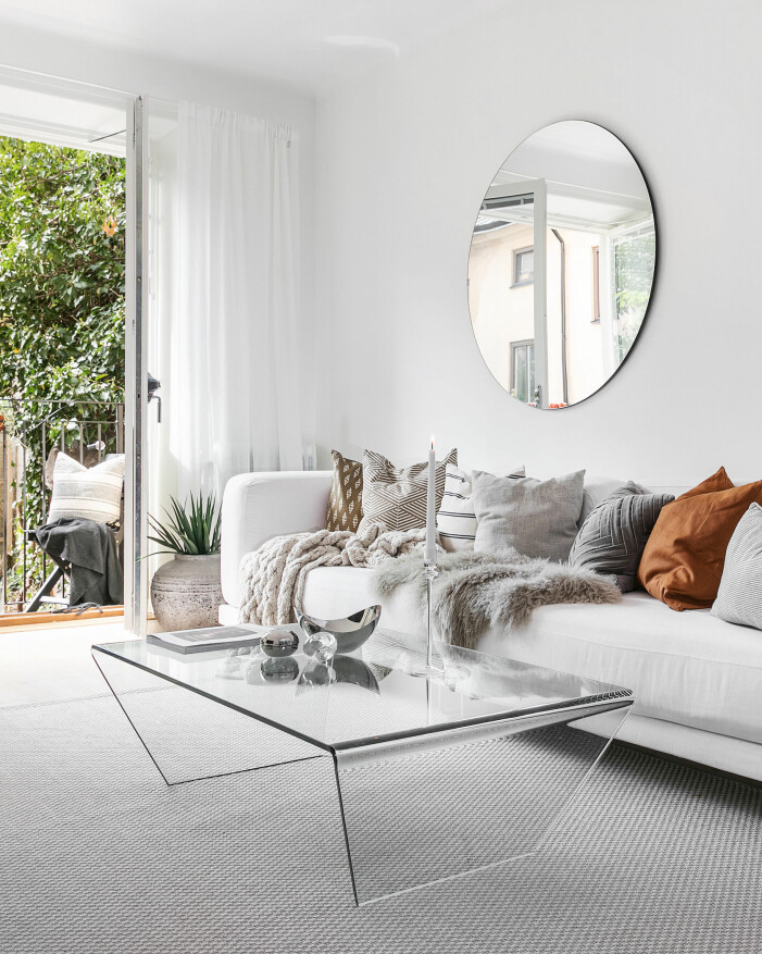 Hemtrevligt och ombonat är två tydliga ledord när det kommer till stylingtrender 2021. Foto: Erik Olsson Fastighetsförmedling. Så stylar du hemma, stylingtrender 2021