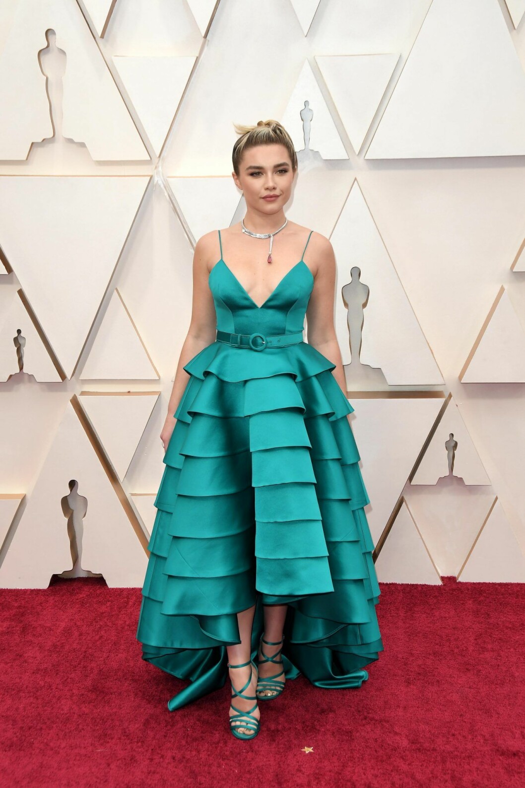 Florence Pugh i grön klänning med volanger