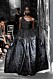 Christian Dior AW19/20, svart voluminös klänning med one-shoulder.