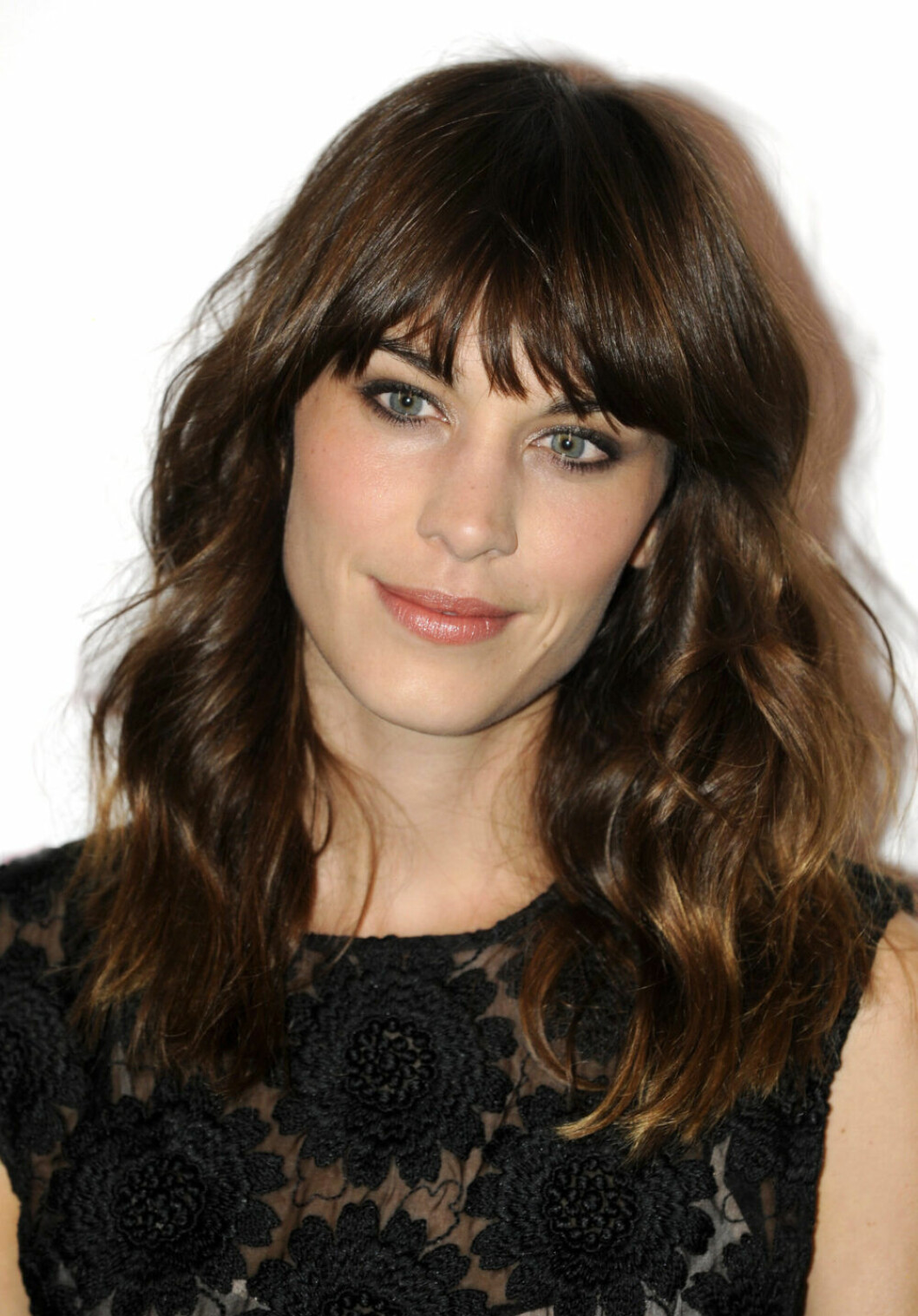 Alexa Chung med långt hår och lugg på the British Fashion Awards 2012.