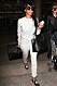 Kris Jenner pushes baby North West as she arrives at LAX with daughters Kendall and Kylie Jenner