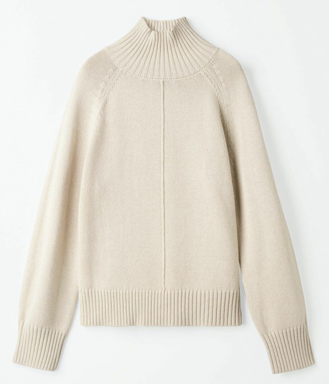 Stickad polotröja i beige från Carin Wester.