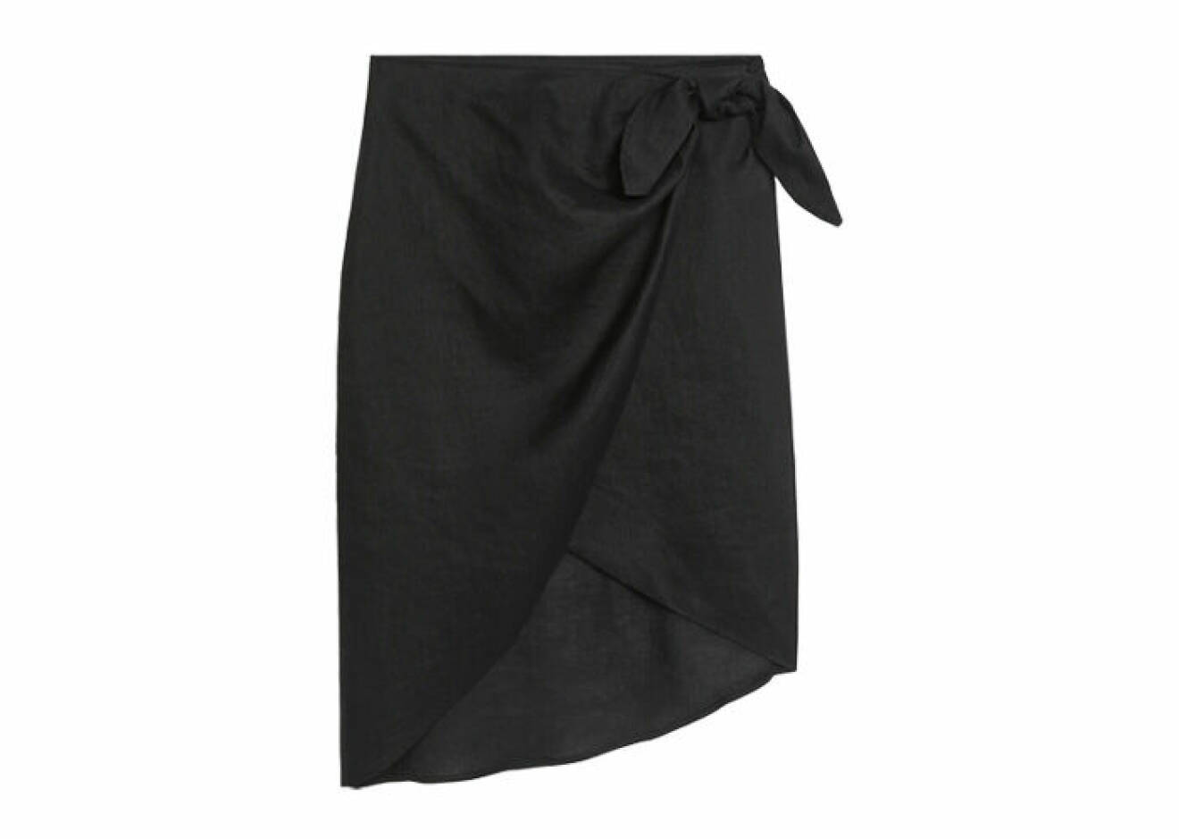 svart kjol i omlottdesign med rosett på sidan gjord i linne från Arket