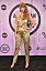 Taylor Swift i guldfärgad jumpsuit på American Music Awards