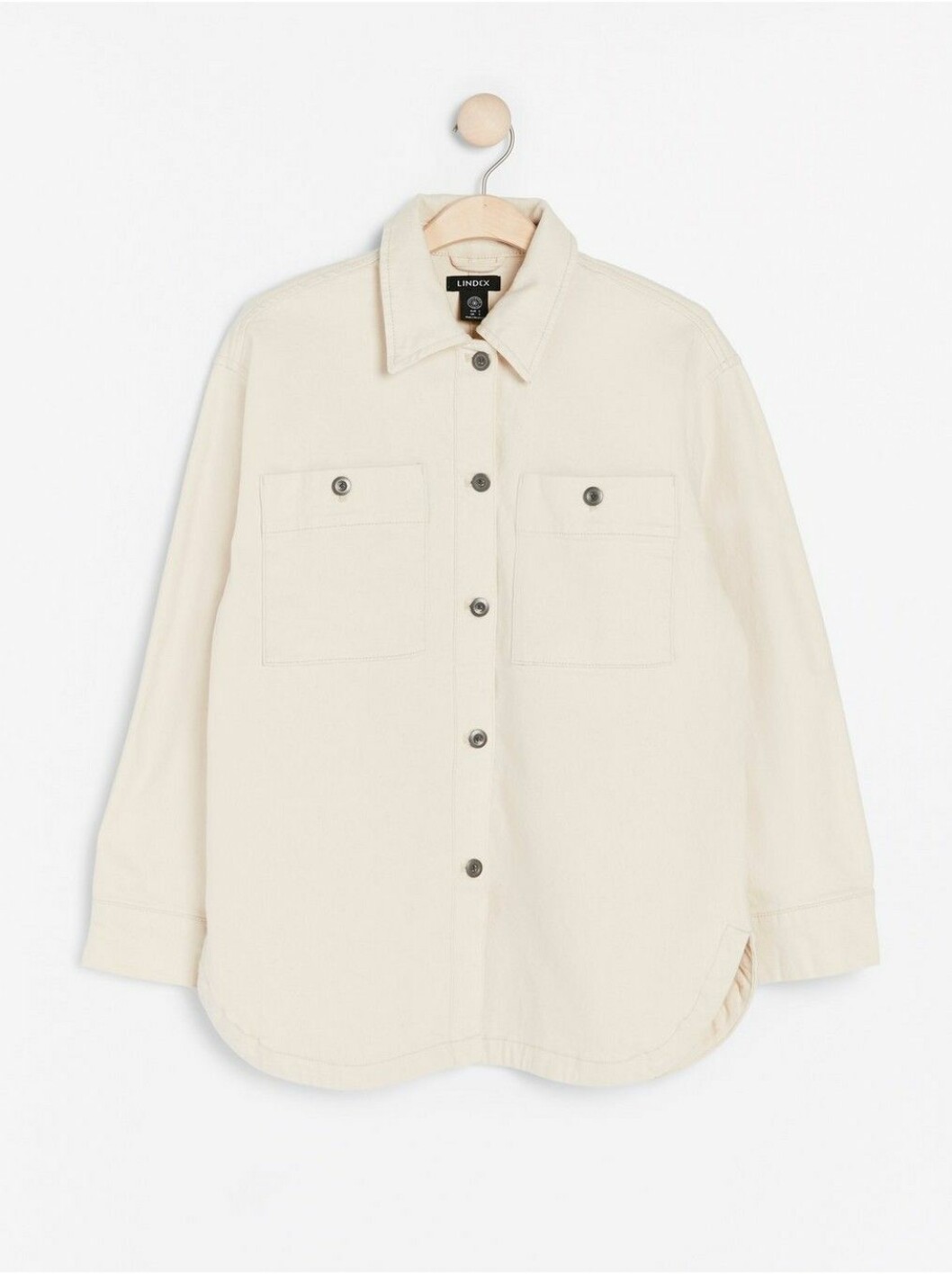 Ljusbeige jacka i oversized modell från Lindex.