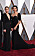Tuva Novotny och Caroline Blanco i varsin svart klänning på Oscarsgalan, 2016.