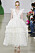 Maffig vit klänning med volanger från Giambattista Valli.