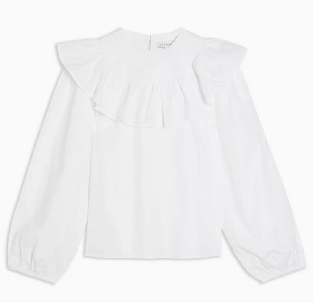 vit blus med volang från Topshop.
