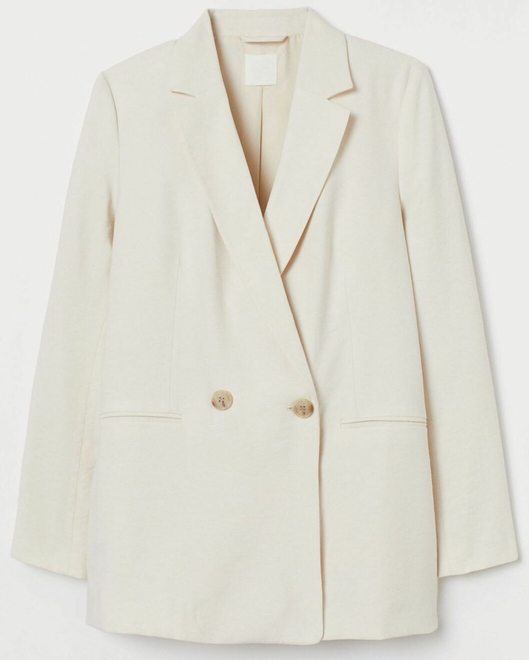 vit kavaj från H&M.