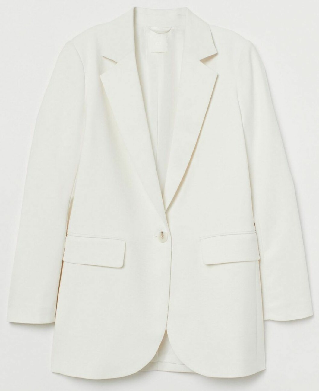 vit kavaj från H&M.