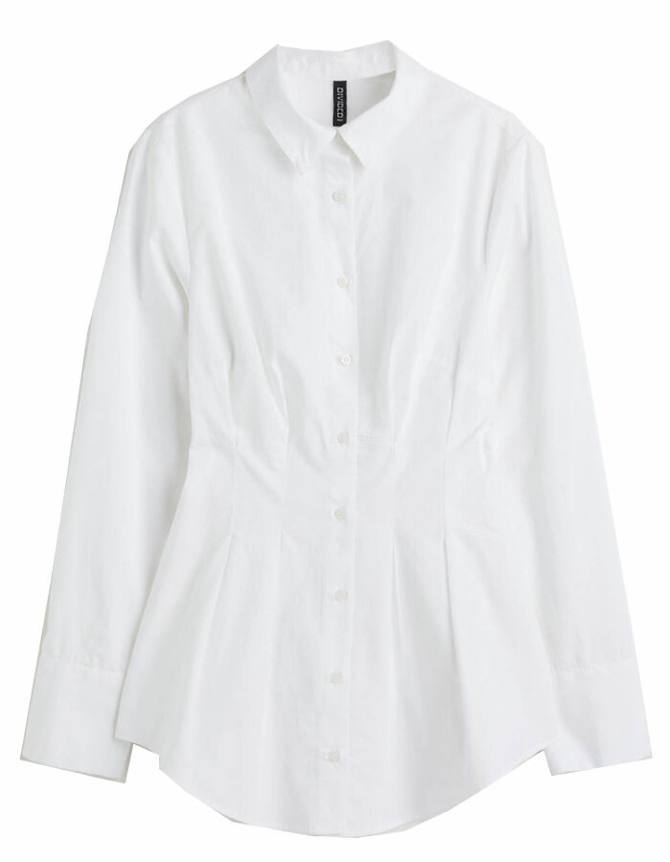 vit skjorta med markerad midja för dam