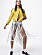 Modellen har på sig en gul jacka från Balenciaga, en vit kjol med fransar och svarta trosor, båda från Extreme Cashmere