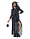 Fotomodellen har på sig en svart dubbelknäppt jacka från Saint Laurent by Anthony Vaccarello och en svart kjol med fransar från Andreadamo